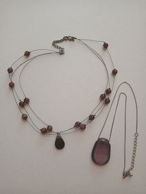#1218. 2 Piece Brown & Purple Glass Cats Eye, Necklace Bundle.